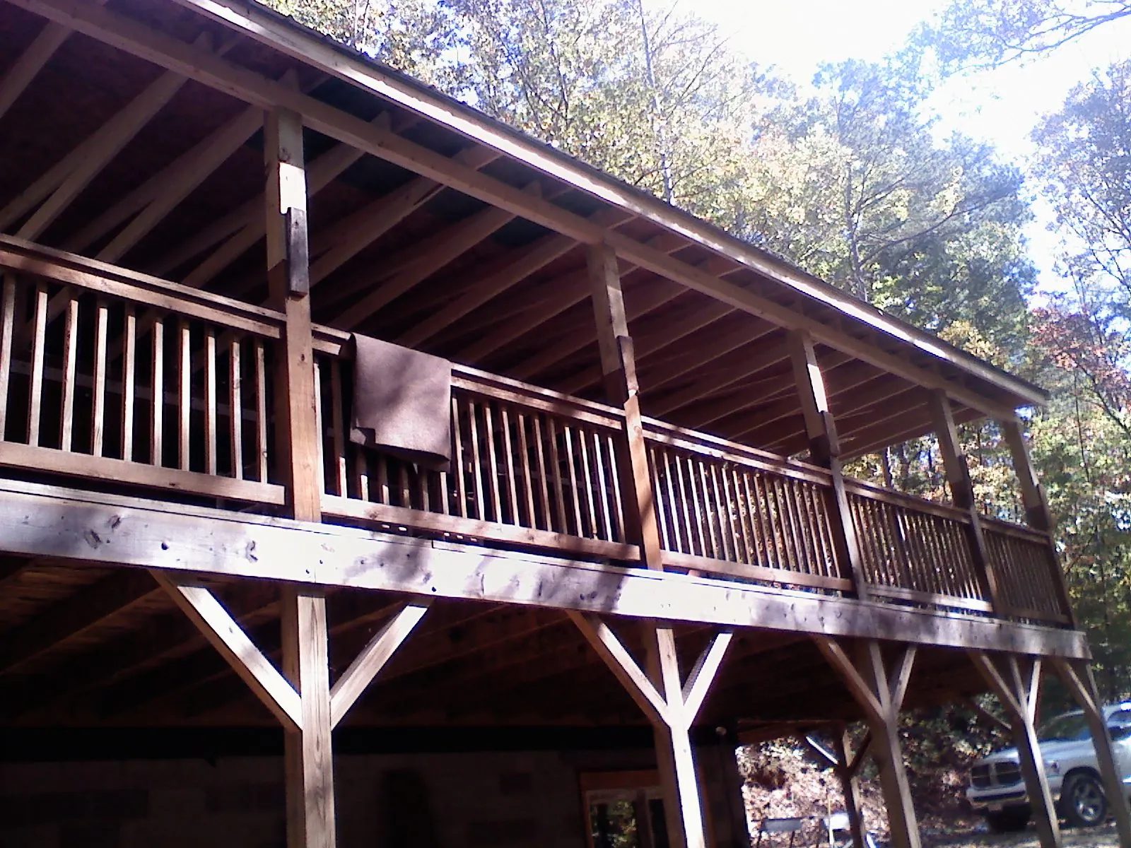 Timber framing under a new elevated porch and deck — Roof Leak Repair in Afton by Roofing Brothers